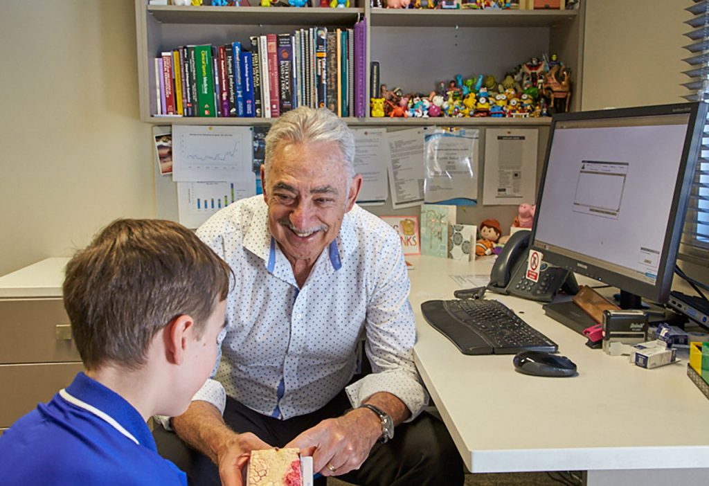 doctor_patient_consultation_male_child_blue_shirt